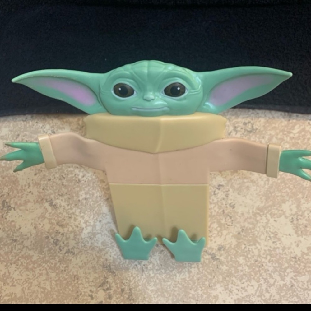 Star Wars Baby Yoda Gorgu Cell Phone Stand. Measurements: 6”H x 8”W